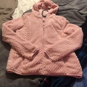 It’s a pink kids jacket it’s in good condition the zipper gets stuck sometimes.